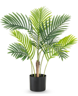 De Kunstplant Phoenix 85 cm heeft verschillende hoge groene palmbladeren en wordt geleverd in een eenvoudige zwarte pot, perfect tegen een witte achtergrond.