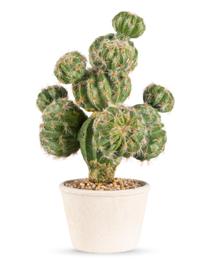 Le Cactus Artificiel 32 cm présente un cactus rond vert avec des épines dans un pot en céramique blanche rempli de petites pierres sur un fond gris clair.