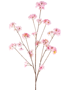 La Fleur de Cerisier Artificielle 130 cm rose a une seule tige brune qui se ramifie en bouquets de délicates fleurs de cerisier roses, magnifiques sur un fond blanc uni.
