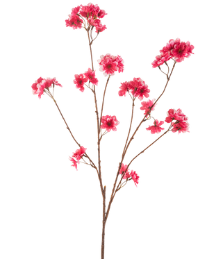 La fleur de cerisier artificielle 114 cm fuchsia présente une seule branche brune avec plusieurs tiges, chacune avec des grappes de fleurs de Noël artificielles fuchsia vibrantes sur un fond blanc uni.
