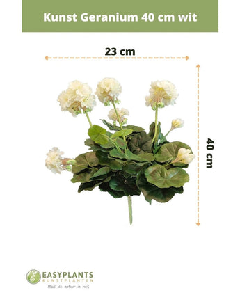 Géranium artificiel 40 cm blanc : plante artificielle aux feuilles vertes, hauteur 40 cm et largeur 23 cm, joliment mise en valeur sur un fond blanc aux dimensions claires.