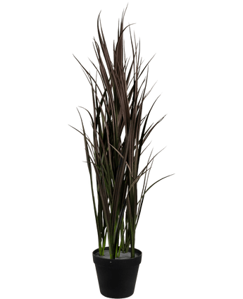 Le gazon artificiel Bordeaux UV 90 cm est une grande plante artificielle aux feuilles longues et étroites, vert foncé et marron, dressées verticalement dans un pot noir, sur un fond blanc uni.