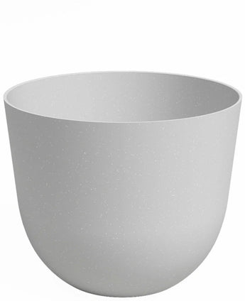 Le Jardinière Havanna Ø20cm x H17cm est un pot de fleur rond uni gris clair au design légèrement effilé et à la finition lisse et mate.