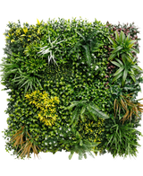 La haie artificielle Eternity 100x100 cm UV présente un panneau carré de diverses plantes vertes, dont des fougères, du lierre et un feuillage luxuriant, créant un jardin vertical intérieur ou extérieur dense sur un fond blanc.