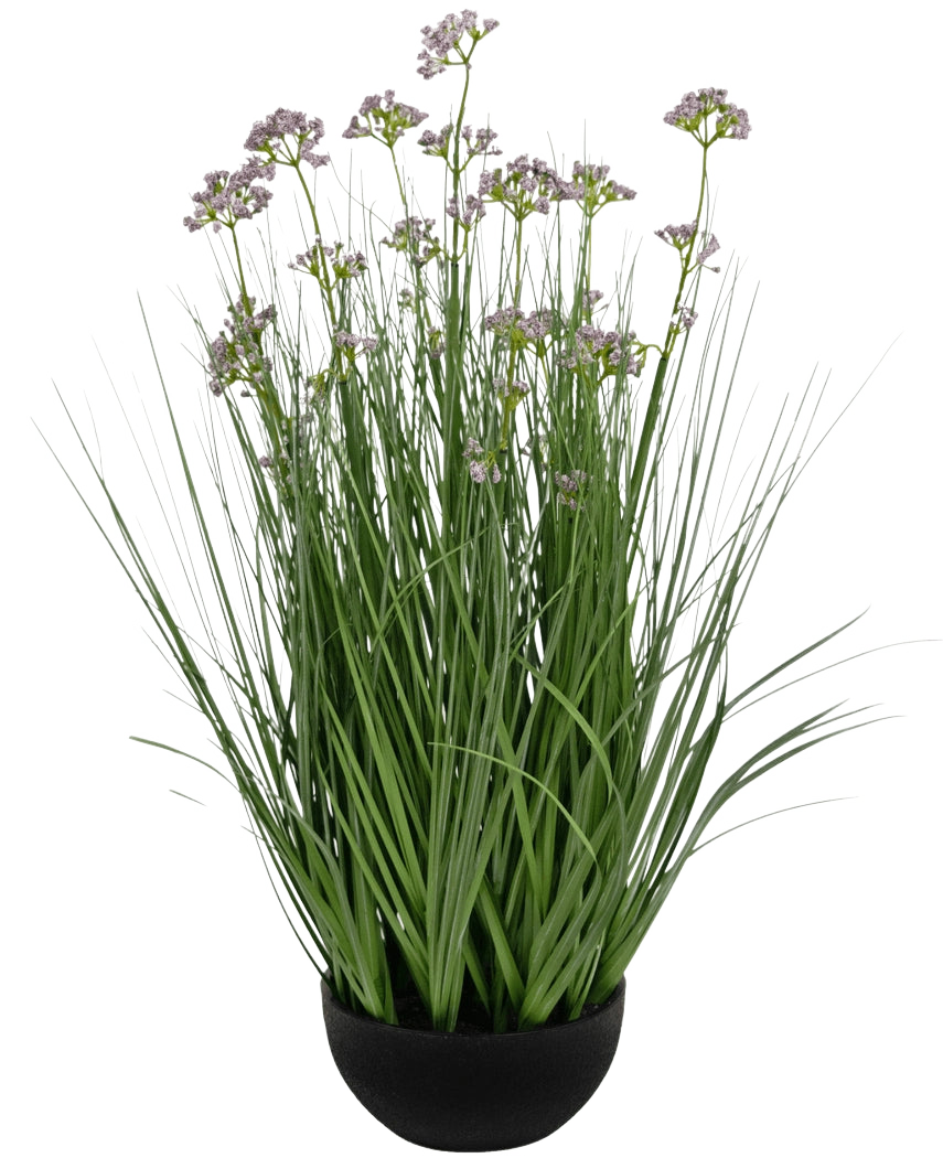 Le pot de gazon artificiel, fleur de poireau, oignon, ignifuge de 60 cm a de hautes et fines feuilles vertes ressemblant à de l'herbe et de délicates petites fleurs violettes dans un pot noir, sur un fond blanc.